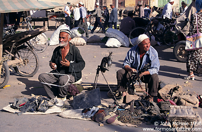 Roadside Handyman, Kashgar Market